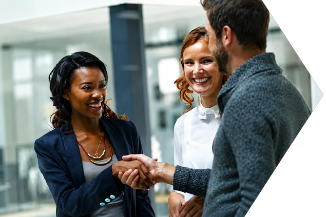 Diverse professionals having a discussion in a modern office.